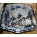 An Edwardian blue and white wash basin and three other pots