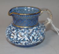 A Venetian enamelled blue glass miniature jug, 5.5cm