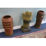 Three terracotta chimney pots L.75cm