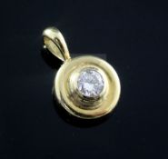 A 1990's Theo Fennell 18ct gold and solitaire diamond pendant, the stone measuring approximately 4.