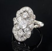 An attractive early 20th century French platinum and diamond cluster upfinger dress ring, of