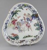 A Chinese famille rose 'foreign ambassadors' dish, Qianlong - Jiaqing period, of leaf form,