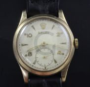 A gentleman's early 1950's 9ct gold mid size Rolex manual wind wrist watch, with Arabic and arrow