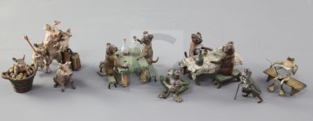 A collection of Austrian cold painted bronze miniatures, comprising dogs drinking at tables (2), a