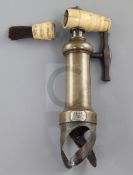 A Lunds Patent double helix ratchet corkscrew, 19th century, with ratchet action, the bottle grip