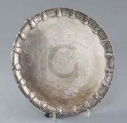 A late Victorian silver salver by William Hutton & Sons, of shaped circular form, with engraved