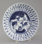 A Chinese blue and white 'deer' dish, Wanli period, the centre painted with two deer in a