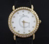 A lady's 18ct gold and diamond Baume & Mercier quartz dress wrist watch, with diamond set bezel