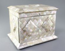 A Victorian mother of pearl and ivory work casket, with blue silk lined interior and three jewellery