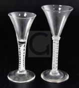 Two opaque twist stem ale glasses, the first c.1770 with a spiral and gauze twist to the stem, 17.