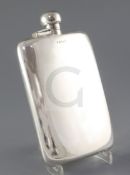 An early 1990's large silver pocket flask, maker. WB, Birmingham, 1991, 22.1cm, 17.7 oz.