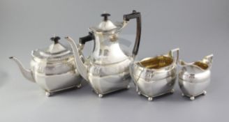 A late Victorian/Edwardian four piece silver tea and coffee service, by The Barnards, with
