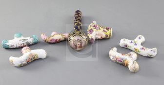 A collection of seven Dresden and Continental porcelain cane or parasol handles, late 19th / early