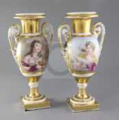 A pair of Paris gilt porcelain vases, decorated with Ganymede and Leda, the reverse with floral