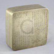 A Chinese inscribed bronze ink box, early 20th century, engraved with the seated figure of a sage