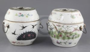 A pair of Chinese Straits porcelain famille rose barrel shaped jars and covers, early 20th