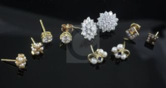 A pair of Cartier 18ct gold disc butterflies, a pair of gold and diamond ear studs and four other