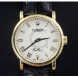 A lady's early 21st century 18ct gold Rolex Cellini quartz wrist watch, with Roman dial, serial