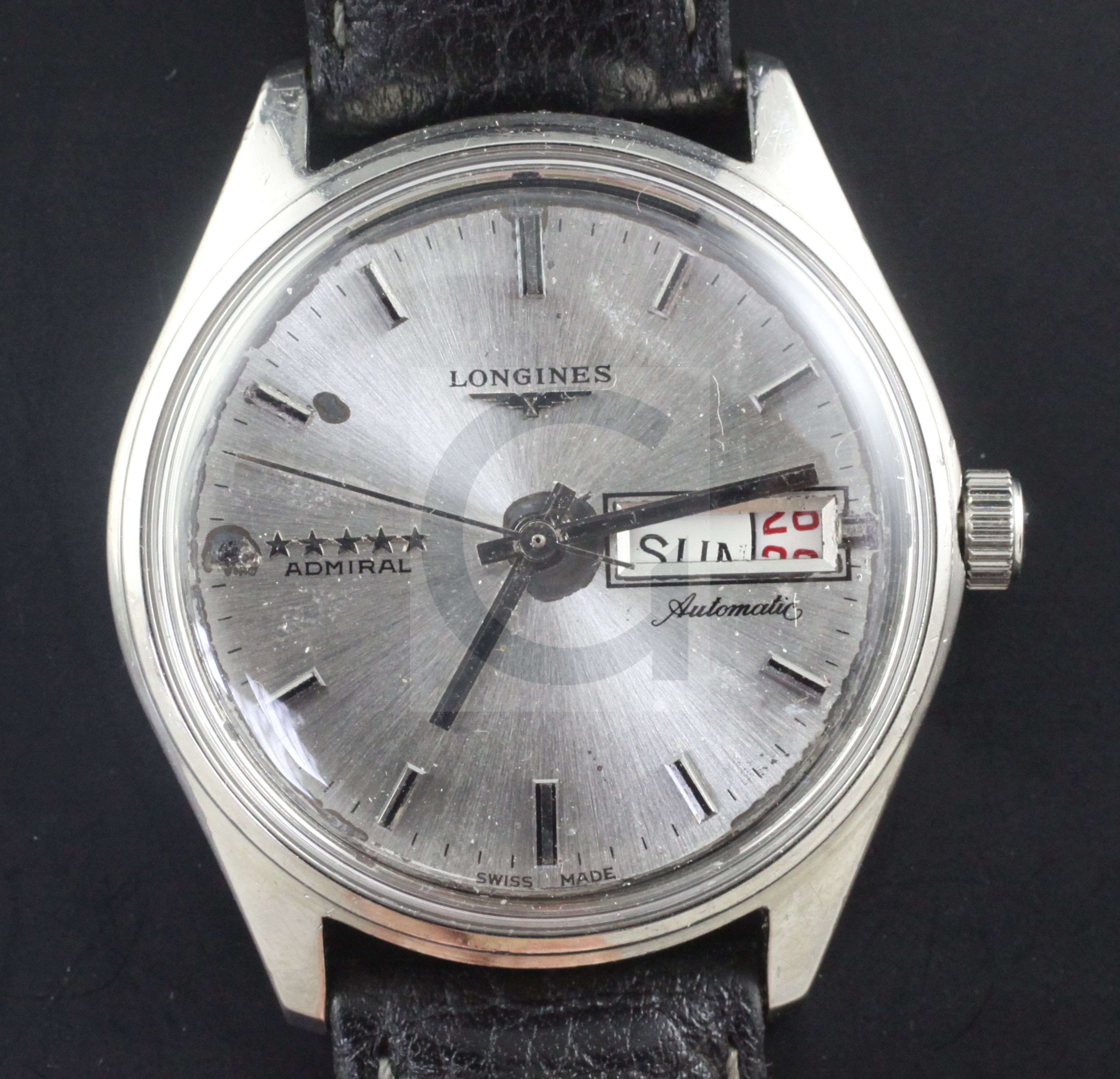 A gentleman's stainless steel Longines Admiral automatic wrist watch, with baton numerals and day/