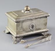 A 19th century Polish silver etrog box, of casket form, with foliate decorated borders, on four