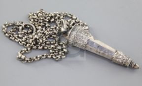 A Victorian silver whistle and case, by George Unite, the case of panelled tapering form,