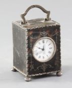 A silver mounted tortoiseshell boudoir timepiece, William Comyns, London 1907, the single train