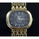 A lady's late 1970's 18ct gold Patek Philippe Calatrava wrist watch, with blue dial, ref. no. 4465/