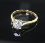 An 18ct gold, platinum and solitaire diamond ring, size L.