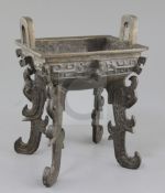 A Chinese bronze quadruped ritual food vessel, Fangding, Western Zhou dynasty or later, cast in