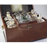 A George III crossbanded mahogany decanter box, the fitted interior with six large gilt glass