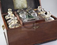 A George III crossbanded mahogany decanter box, the fitted interior with six large gilt glass