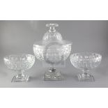 A Baccarat covered glass pedestal punch bowl, on square foot and a pair of matching side bowls,