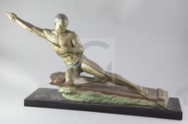 A French Art Deco spelter study of a man on a raft, raised on a polished slate base, height 13.75in.