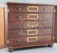 A Victorian mahogany collector's cabinet, with two doors enclosing five drawers, fitted with a