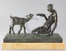 Marcel Courbier (1898-1976). A 1920's bronze figure group 'La Jeune Fille au Chevreau', modelled