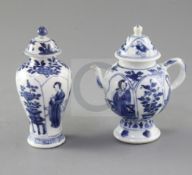 A Chinese blue and white vase and cover and a similar wine pot and cover, Kangxi period, each