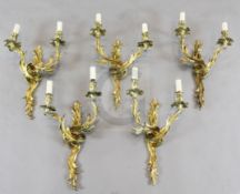 A set of five ormolu twin branch wall appliques, each formed with scrolled acanthus fronts, height