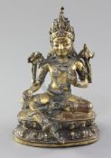 A Tibetan gilt copper alloy seated figure of Green Tara, 17th / 18th century, with some later