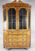 A 19th century Dutch walnut and marquetry vitrine, decorated with ribbon tied floral swags and