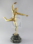 Salvatore Melani. A 1930's gilt bronze figure of a dancer, modelled poised on one leg, raised on a