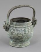 A small Chinese archaic bronze ritual wine vessel, You, Western Zhou dynasty, 10th century B.C.,