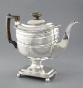 A George III silver pedestal coffee pot, by William Bennett, hallmarked London 1811, with rounded