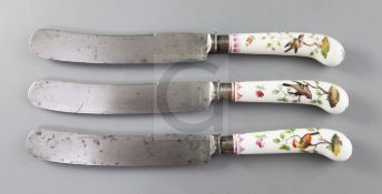 Three Meissen porcelain handled knives, late 18th century, each painted with a bird perched in a