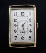 A gentleman's 1930's 9ct gold Rolex manual wind wrist watch, with large curved rectangular Arabic