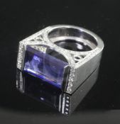 A fancy modern 18ct white gold, tanzanite and diamond dress ring by Theo Fennell, of rectangular