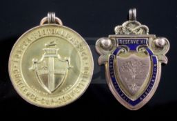 Two 9ct gold football related medals: 1 x 1909-1910 L.F.A. Challenge Cup Competition medal awarded