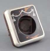 A George V silver and tortoiseshell pique mounted travelling watch case by Charles & Richard Comyns,