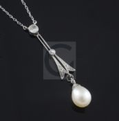 A 1920's platinum, diamond and cultured pearl drop pendant on a platinum fine link chain, pendant