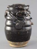 Chinese Henan ware black glazed jar, Song dynasty, the ribbed body modelled in relief with an
