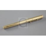 A 1930's 18ct gold cased Swan fountain pen, 13.4cm.